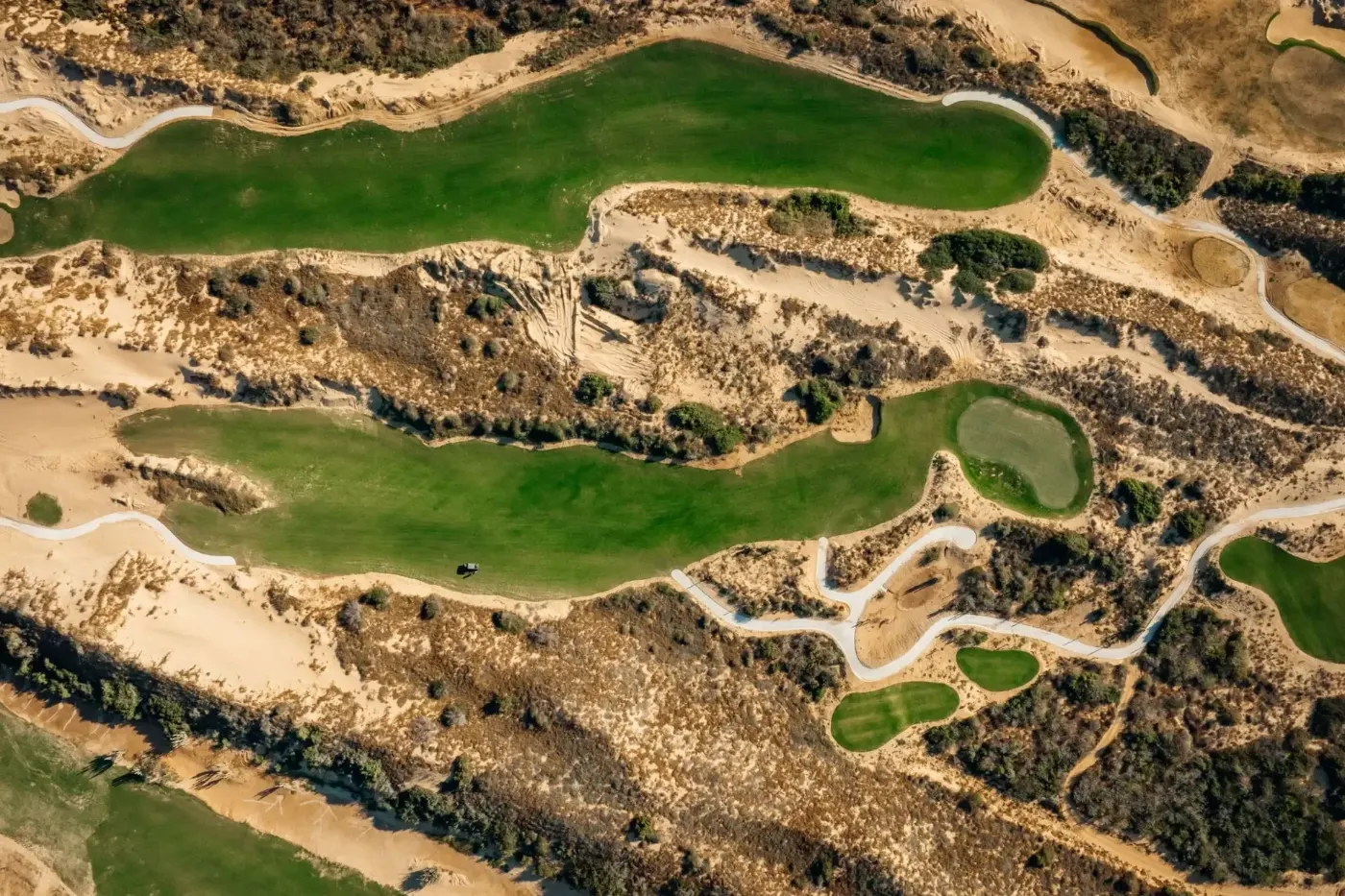 Aerial of Oleada's fairways through the dunes