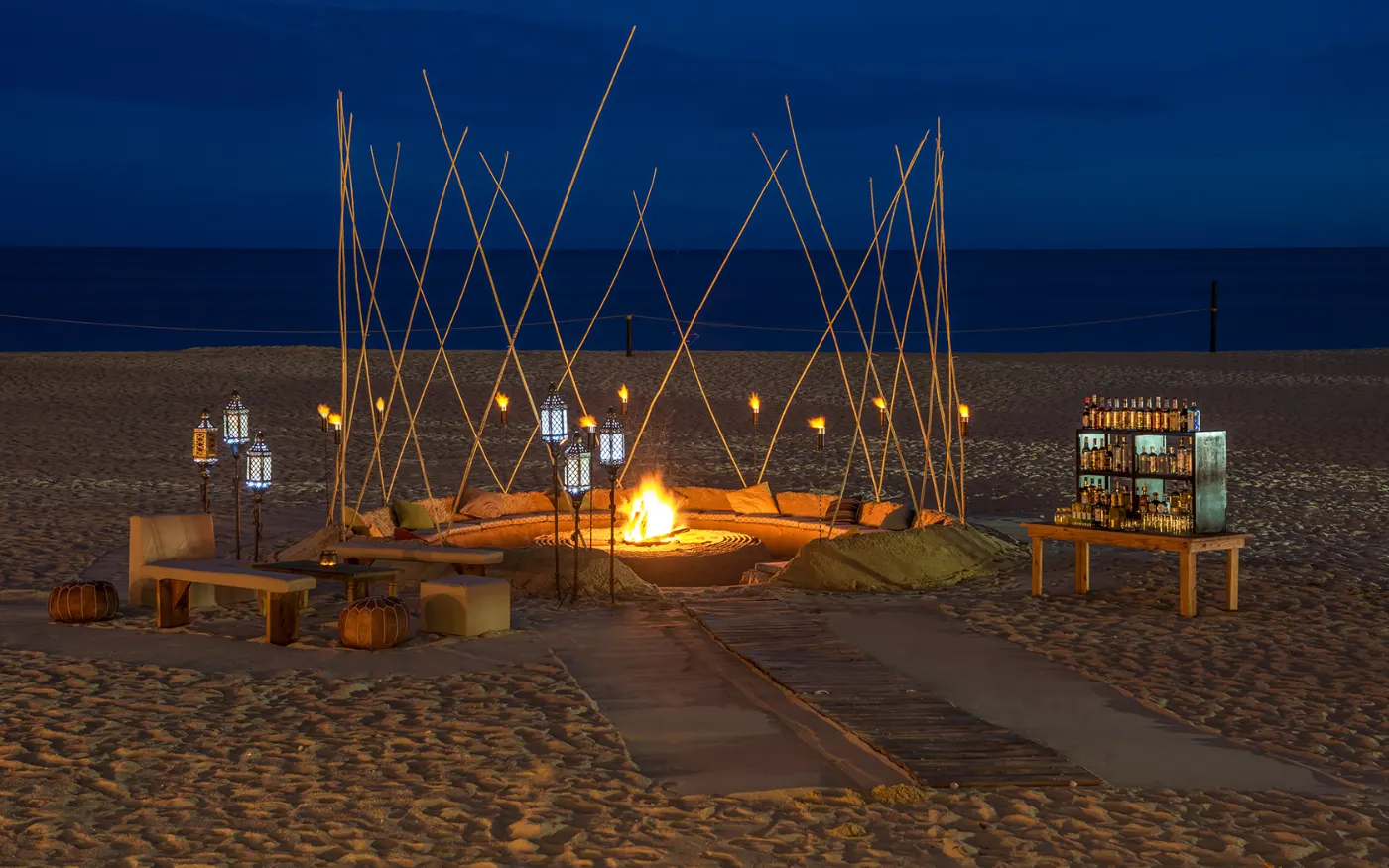 Beach firepit set up at night