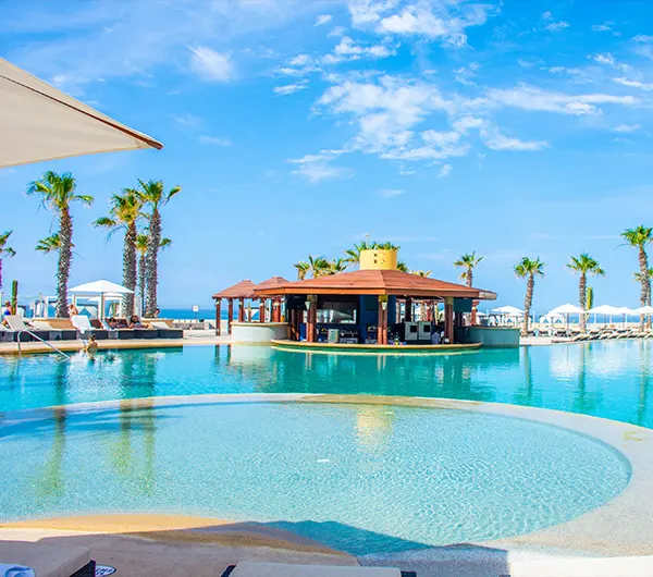 Aire poolside restaurant and swim-up Aquabar
