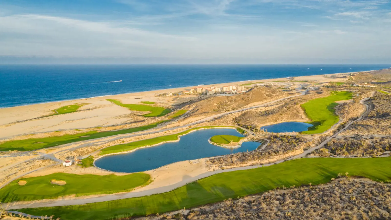 Aerial view of Solmar Golf Links between desert and the Pacific